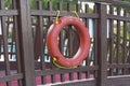 life belt, rescue ring on wooden wall buoy photo Royalty Free Stock Photo