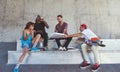 Life is better with friends. a group of skaters having lunch together. Royalty Free Stock Photo
