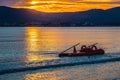 Life boat in Alghero shore at sunset Royalty Free Stock Photo