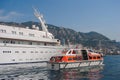 Life boat alongside big yacht ship. Royalty Free Stock Photo