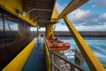 Life boat hanging from the davits of a Ferry. Royalty Free Stock Photo