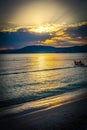 Life boat by the shore in Maria Pia beach at sunset Royalty Free Stock Photo