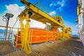 Life boat or survival craft at muster station of oil and gas drilling rig Royalty Free Stock Photo