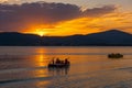 Life boat in the water at sunset Royalty Free Stock Photo