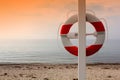 Life buoy on the beach Royalty Free Stock Photo