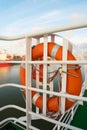 Life buoy on boat in harbor Royalty Free Stock Photo