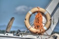 Life buoy on a boat side in hdr Royalty Free Stock Photo