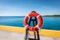 Life buoy of cruise ship on the pier in Costa Maya, Mexico. Royalty Free Stock Photo