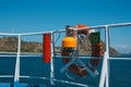 Life buoy on the deck of a ferry ship. Royalty Free Stock Photo