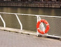 Life buoy on embankment for help and assistance