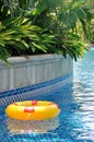 Life buoy floating in swimming pool Royalty Free Stock Photo