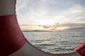 Life buoy frame and sea sunset Royalty Free Stock Photo
