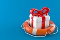 Life buoy with gift Royalty Free Stock Photo