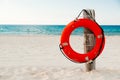 Life buoy on a pole on a beach in Mexico Royalty Free Stock Photo