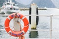 Life buoy at port for safety taken in Milford Sound New Zealand Royalty Free Stock Photo