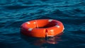 Life buoy or rescue buoy floating on sea to rescue people from drowning man. Royalty Free Stock Photo