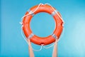 Life buoy ring in female hands Royalty Free Stock Photo