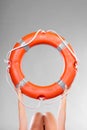 Life buoy ring in female hands Royalty Free Stock Photo