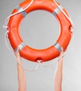 Life buoy ring in female hands Royalty Free Stock Photo