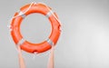 Life buoy ring in female hands Royalty Free Stock Photo