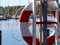 Life buoy ring hanging in a marina