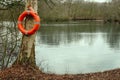 Life saving equipment at the lakeside. Royalty Free Stock Photo