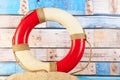 Life buoy in the sand Royalty Free Stock Photo