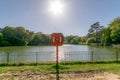 Life Buoy at urban park lake Royalty Free Stock Photo