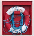 Life buoy on a wood background Royalty Free Stock Photo