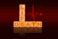 Life and Dealth Concept on Building Blocks and Heart Rate Stopped