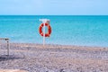 Life rescue drowning buoy ring water red ocean assistance help, concept lifesaver lifeguard from emergency from hand Royalty Free Stock Photo