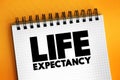 Life expectancy - statistical measure of the average time an organism is expected to live, text concept on notepad