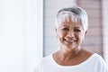 Life gets better and better with age. Portrait of a cheerful mature woman with a bright smile looking at the camera. Royalty Free Stock Photo