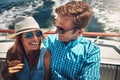 When life gives you water, go boating. a young couple spending time together on a yacht. Royalty Free Stock Photo