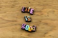 Life good great enjoy happy healthy letterpress quote Royalty Free Stock Photo