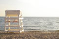 Life guard chair on deserted beach Royalty Free Stock Photo