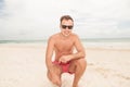 Life guard sitting on the beach