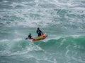 Life guards on heaving oceans