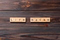 life hacks word written on wood block. life hacks text on table, concept Royalty Free Stock Photo