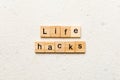 life hacks word written on wood block. life hacks text on table, concept Royalty Free Stock Photo