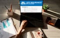 Life insurance online application form on device screen. Royalty Free Stock Photo