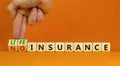 Life insurance symbol. Businessman turns cubes and changes concept words No insurance to Life insurance. Beautiful orange table