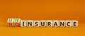 Life insurance symbol. Turned wooden cubes and changed concept words No insurance to Life insurance. Beautiful orange table orange