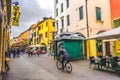 Daily life in Italy business man bicycle downtown roads Padua green newsstand kiosk street
