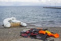 Life Jackets discarded on a beach. Refugees come from Turkey in an inflatable boat.