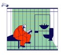 Life in Jailhouse. Arrested Convict Man Sitting in Cell with Sink and Toilet Behind of Metal Bars Reading Book Royalty Free Stock Photo