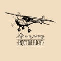 Life is a journey, enjoy the flight motivational quote. Vintage airplane logo. Hand sketched aviation illustration. Royalty Free Stock Photo