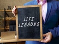 LIFE LESSONS sign on the chalkboard