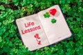 Life lessons text in notebook Royalty Free Stock Photo