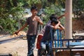 Life and lifestyle of Cambodian boy children kid people posing portrait for take photo with foreign traveler travel visit in Royalty Free Stock Photo